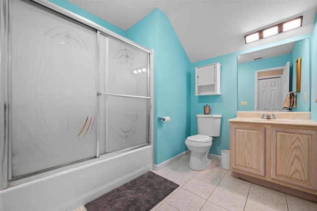 full bath featuring baseboards, toilet, tile patterned floors, combined bath / shower with glass door, and vanity