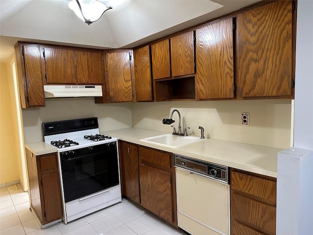 kitchen with dishwasher, light countertops, under cabinet range hood, a sink, and gas stove