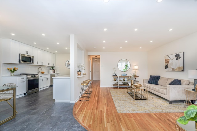 living room with hardwood / wood-style flooring