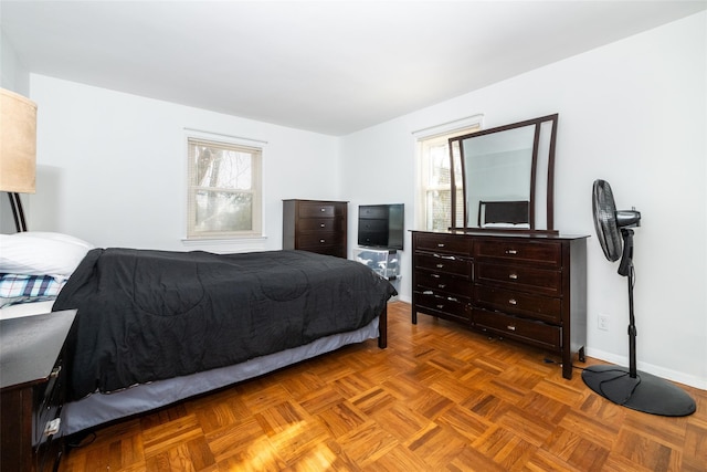 bedroom featuring baseboards