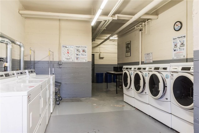 community laundry room featuring independent washer and dryer