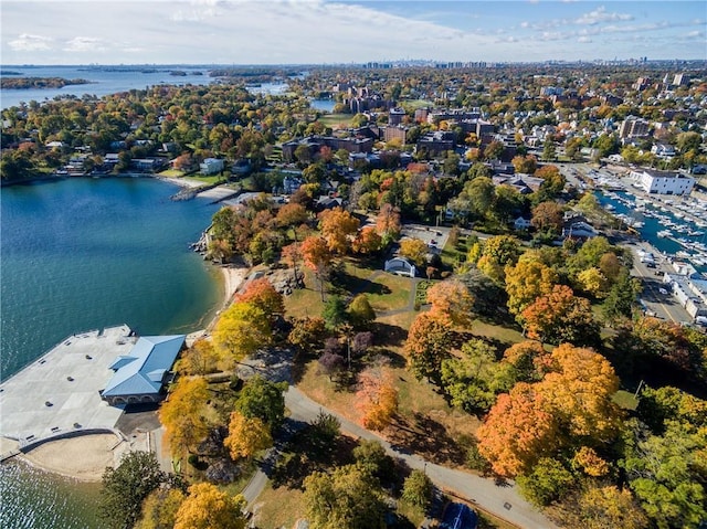 birds eye view of property featuring a water view and a residential view