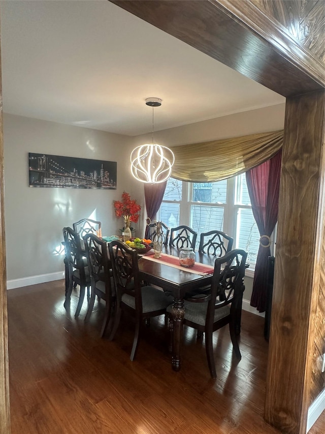 110-37 213th St, Queens Village, NY 11429 - dining space featuring a chandelier and dark hardwood / wood-style floors