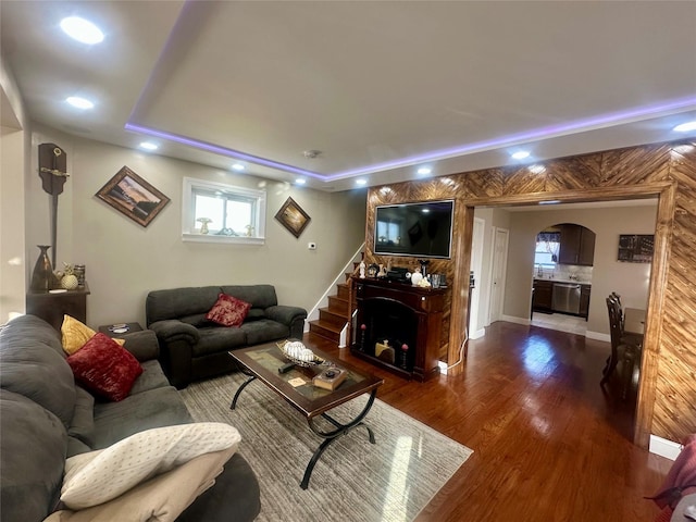 110-37 213th St, Queens Village, NY 11429 - living room with dark hardwood / wood-style flooring and a raised ceiling