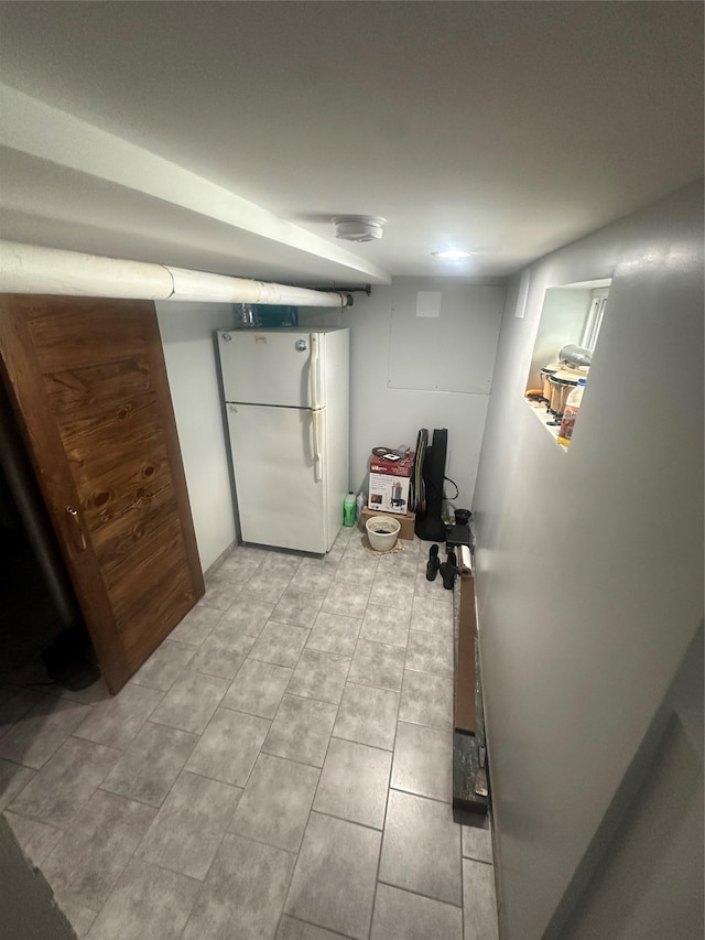 110-37 213th St, Queens Village, NY 11429 - basement with white refrigerator