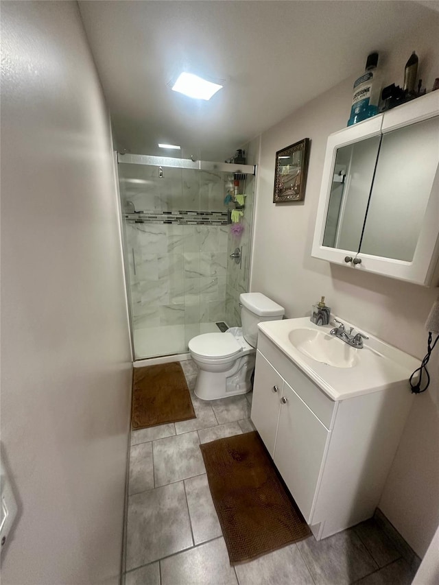 110-37 213th St, Queens Village, NY 11429 - bathroom featuring vanity, a shower with door, and toilet