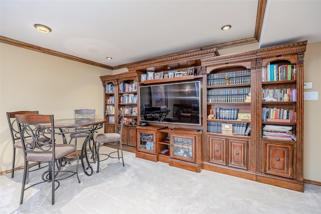 interior space featuring ornamental molding and recessed lighting