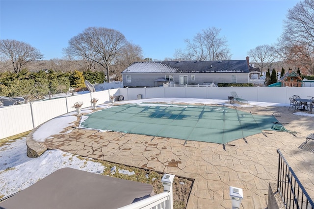 view of pool featuring a fenced in pool, a fenced backyard, and a patio