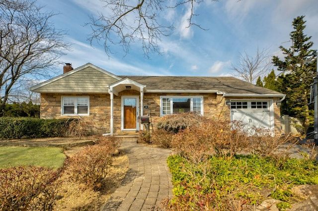 ranch-style house featuring a garage, stone siding, and a chimney