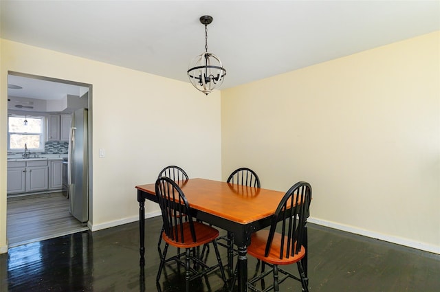 125 Cedar Hill Rd, Wappingers Falls, NY 12590 - dining space featuring baseboards, a chandelier, and dark wood finished floors