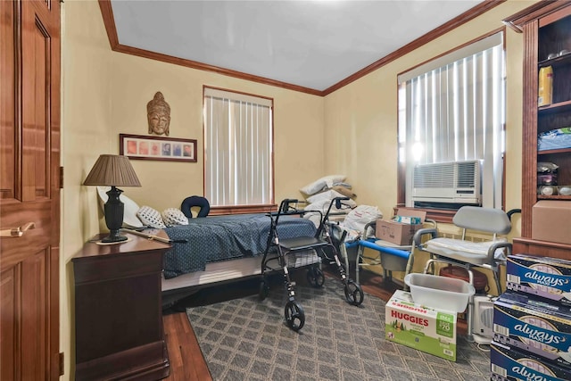 bedroom with ornamental molding, cooling unit, and dark wood finished floors