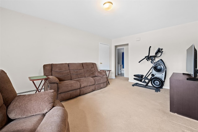 carpeted living room featuring baseboard heating