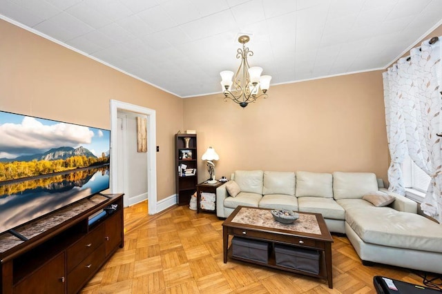 living room with a notable chandelier, light parquet flooring, and ornamental molding