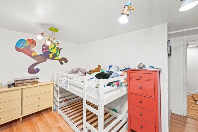 bedroom with light hardwood / wood-style floors