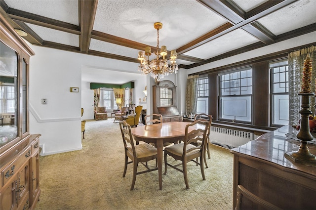 dining room featuring radiator, light carpet, coffered ceiling, and beamed ceiling