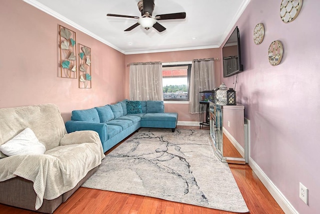 4016 Wilder Ave, Bronx, NY 10466 - living area featuring a ceiling fan, baseboards, crown molding, wood finished floors, and a fireplace