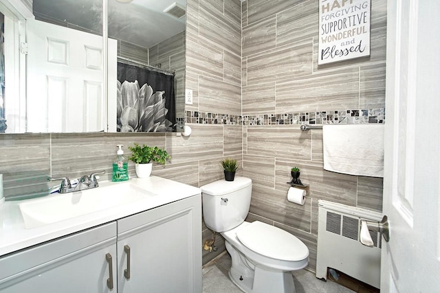 4016 Wilder Ave, Bronx, NY 10466 - full bathroom with radiator heating unit, toilet, vanity, and curtained shower