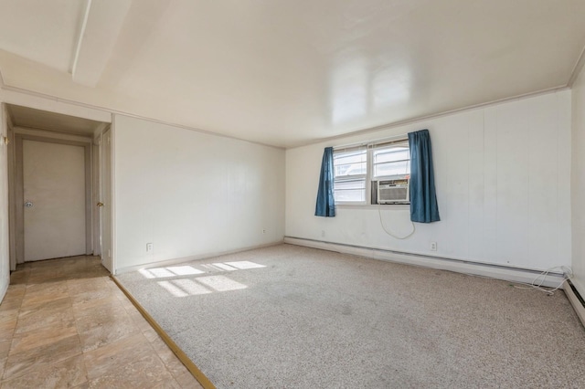 empty room with a baseboard radiator, cooling unit, and light colored carpet