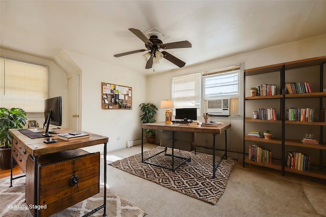 office area with carpet floors, ceiling fan, and baseboard heating