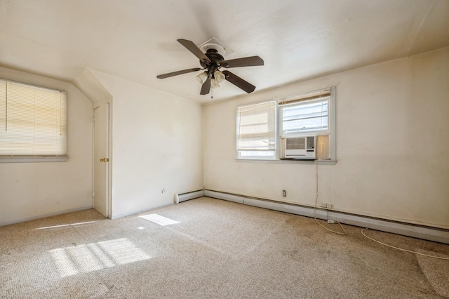 unfurnished room featuring carpet floors, a baseboard heating unit, and ceiling fan