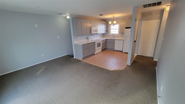 kitchen featuring gray cabinetry, carpet floors, white appliances, visible vents, and open shelves