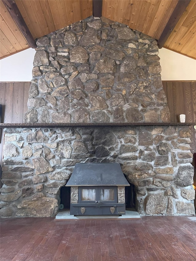 interior details featuring wood finished floors, wood ceiling, and beam ceiling