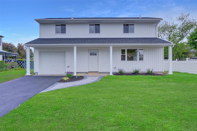 view of front of house with aphalt driveway, a front yard, a shingled roof, and fence