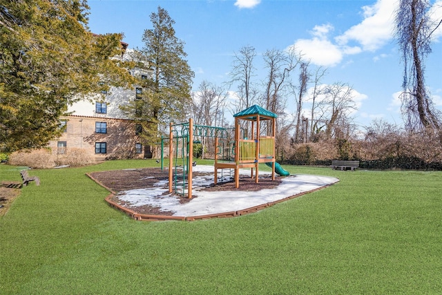 community jungle gym with a lawn