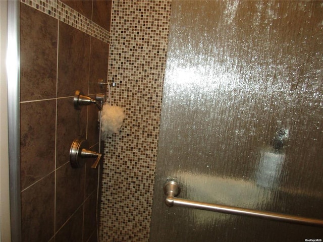 room details featuring a shower stall
