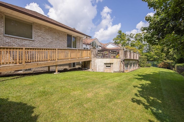 view of yard with a deck