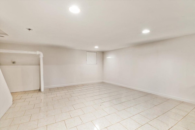 finished below grade area featuring recessed lighting