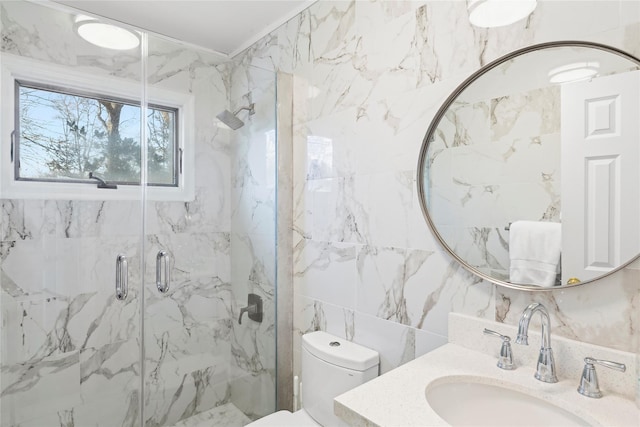 bathroom with toilet, vanity, tile walls, a marble finish shower, and decorative backsplash