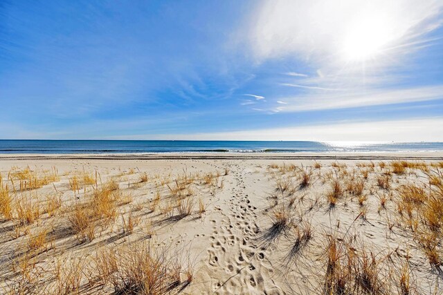 property view of water with a beach view