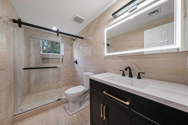 bathroom with visible vents, toilet, tile walls, and vanity