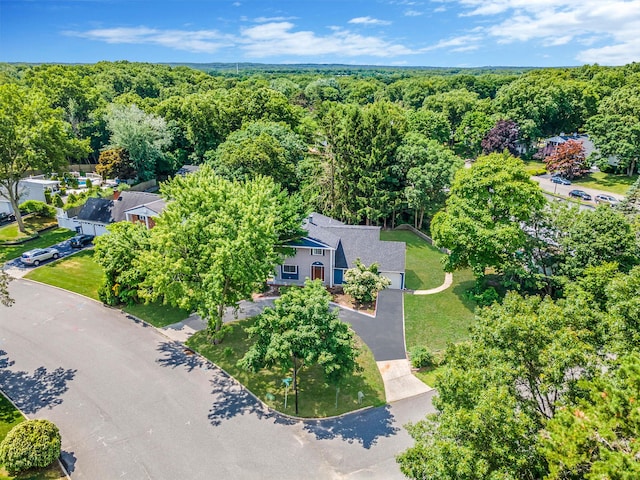 aerial view featuring a forest view