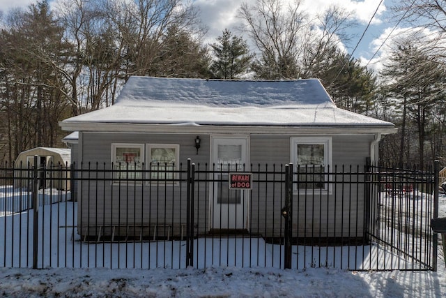 exterior space featuring a fenced front yard