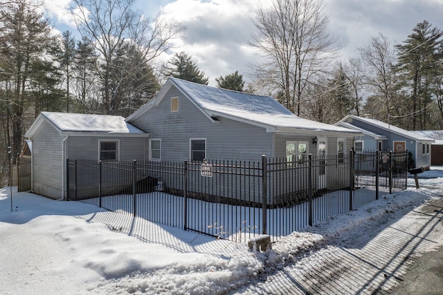 exterior space with a fenced front yard