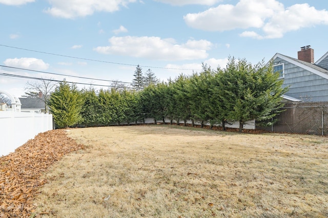 view of yard featuring a fenced backyard