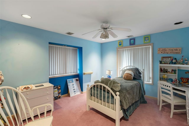 bedroom with a ceiling fan, carpet, visible vents, and baseboards