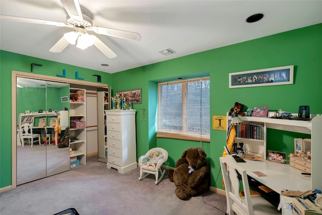 rec room featuring baseboards, carpet flooring, visible vents, and a ceiling fan