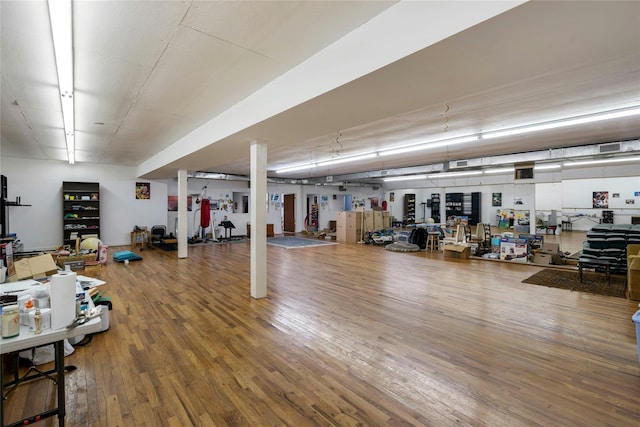 miscellaneous room featuring wood finished floors