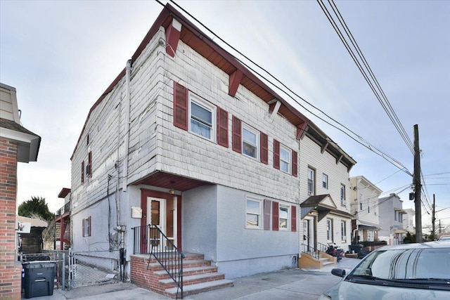 view of front of house with fence