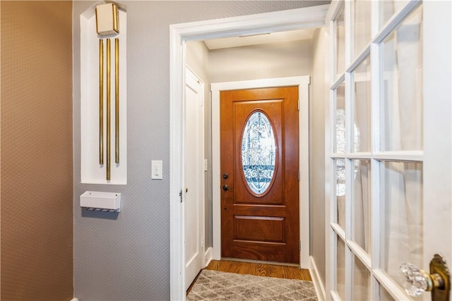 foyer entrance featuring light wood-style flooring