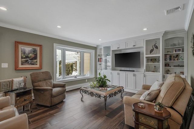 living area with dark wood finished floors, visible vents, crown molding, and recessed lighting