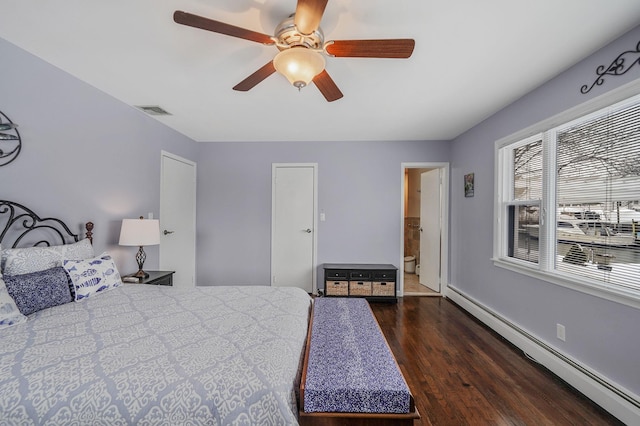 bedroom featuring dark wood-style floors, a baseboard radiator, visible vents, a ceiling fan, and baseboards