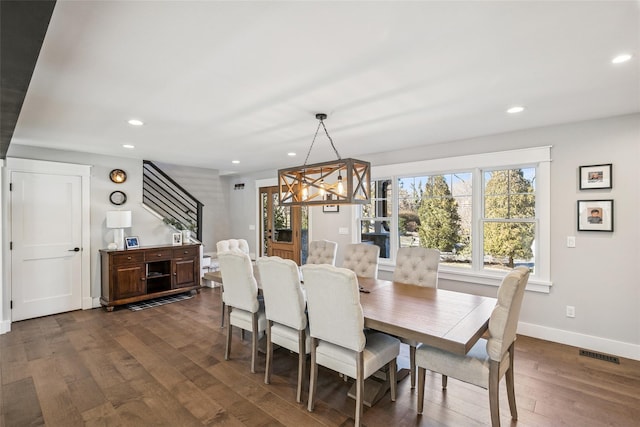 dining area with baseboards, visible vents, dark wood-style floors, stairway, and recessed lighting