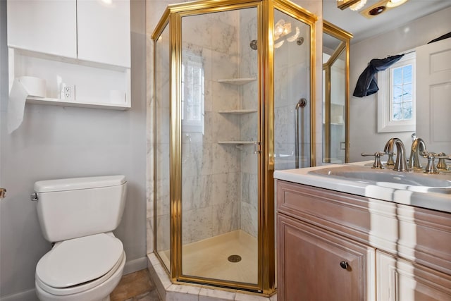 full bath with toilet, a stall shower, and vanity