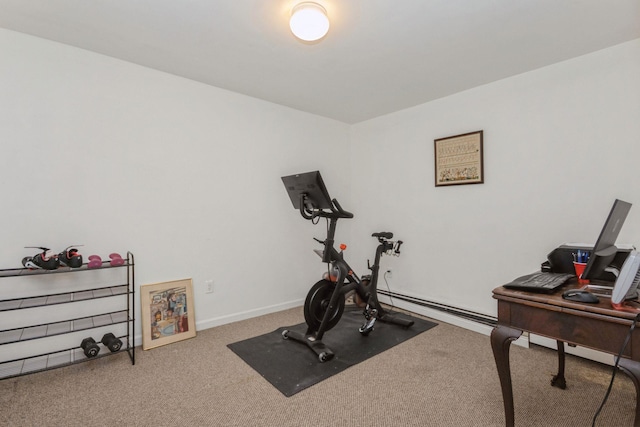 exercise room featuring baseboards, carpet flooring, and baseboard heating