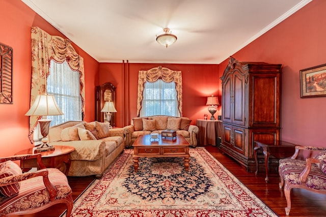 sitting room featuring ornamental molding and wood finished floors