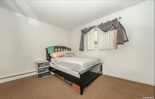 bedroom with a baseboard radiator and carpet flooring